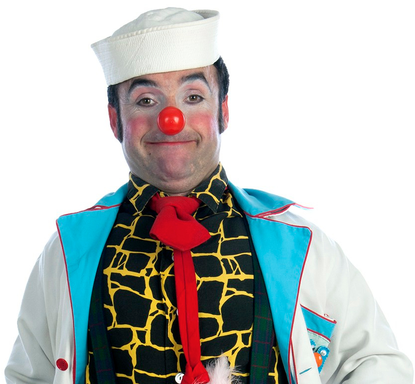 Payaso Ventura sonriendo con los labios y levantando las cejas